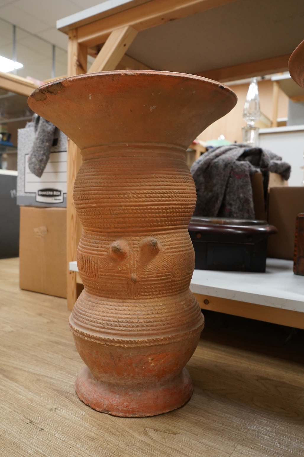 African art - a 20th century Nigerian terracotta nupe pot support, 51cm
